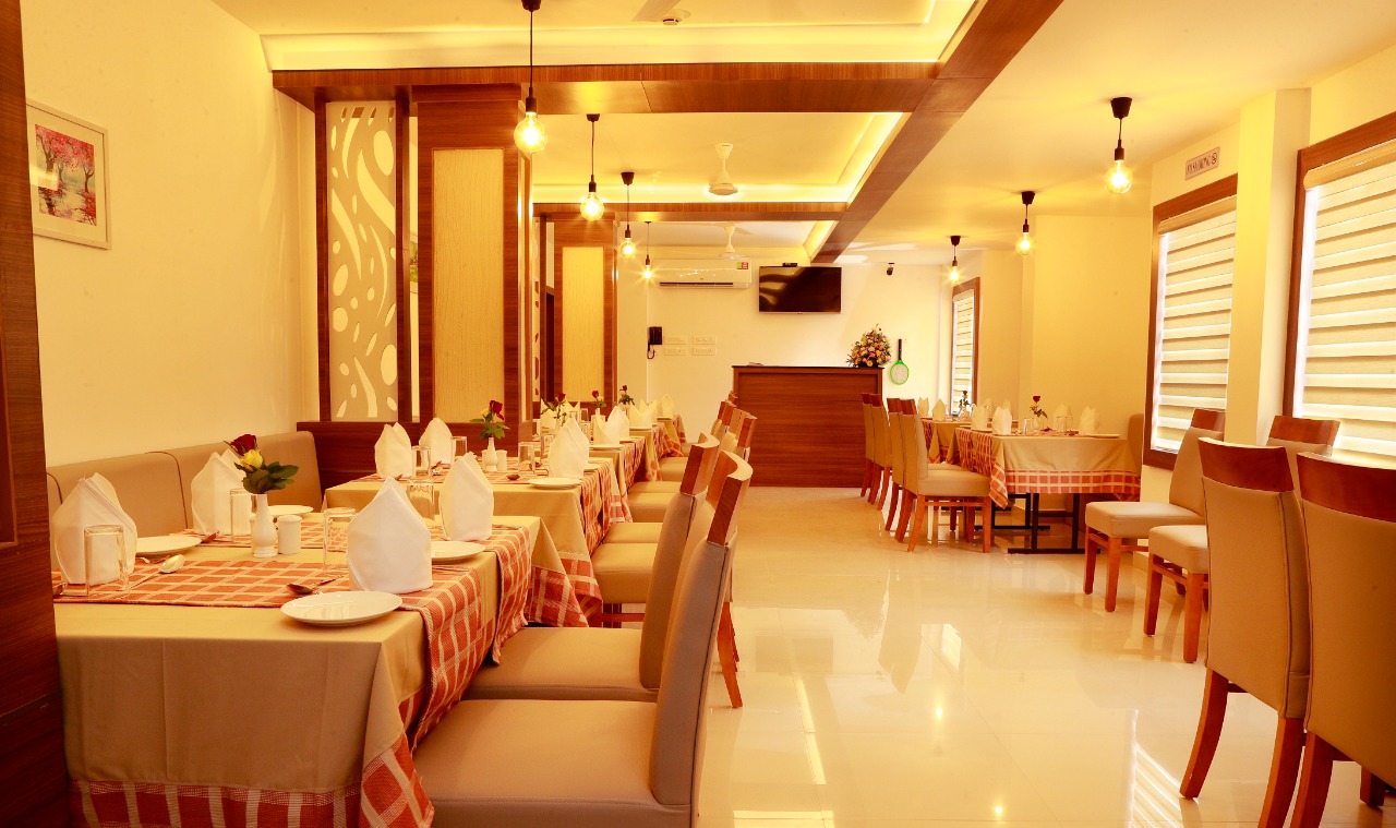 Multi-cuisine dining hall at Geminy Tourist Home